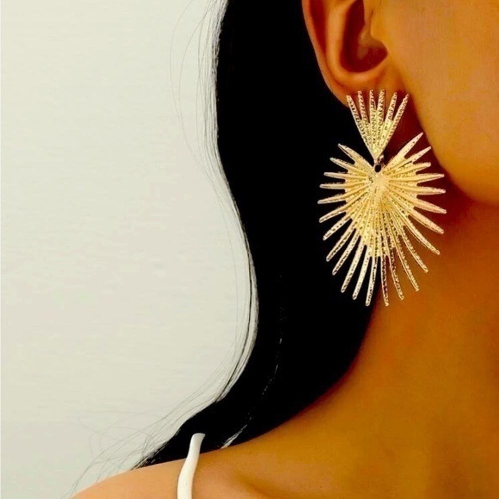 Gold burst drop earrings